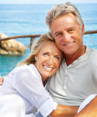 a photo of an old couple being happy